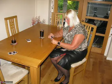 Mature Blonde BBW Strips Out of Her Lingerie and Stockings for Poker