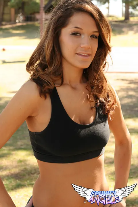 Brittany Maree: Thick Brunette Poses Outdoors in Shorts and a Sports Bra – photo 11 of 12