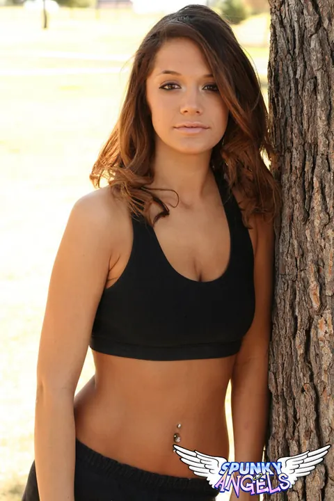 Brittany Maree: Thick Brunette Poses Outdoors in Shorts and a Sports Bra – photo 6 of 12