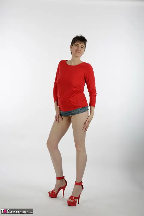 Thick European MILF in Red Heels Strips Out of Her Skirt – photo 8 of 20