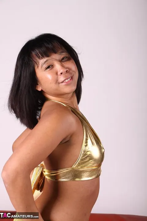 Melissa Deep: Asian MILF in a Bikini and Heels Plays with Her Hair – photo 7 of 20