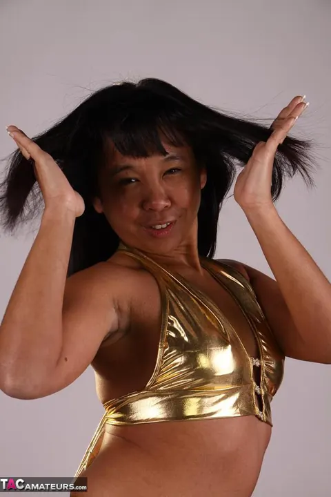 Melissa Deep: Asian MILF in a Bikini and Heels Plays with Her Hair – photo 9 of 20