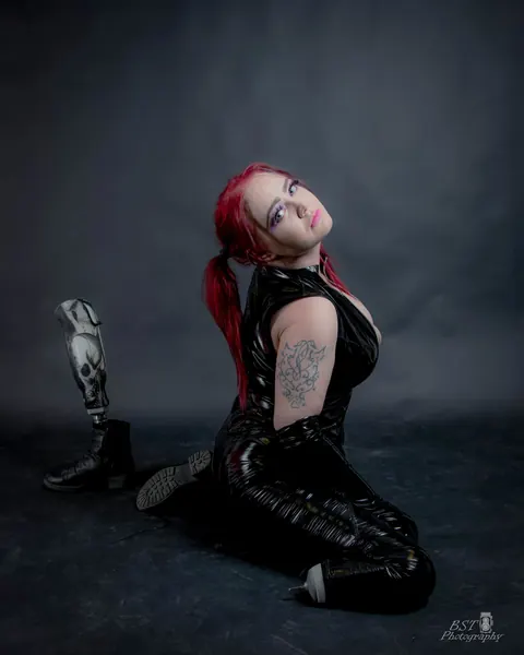 European Redhead with Big Tits Poses in a Latex Outfit – photo 6 of 20