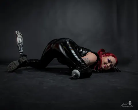 European Redhead with Big Tits Poses in a Latex Outfit – photo 17 of 20