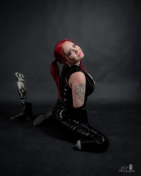 European Redhead with Big Tits Poses in a Latex Outfit – photo 2 of 20