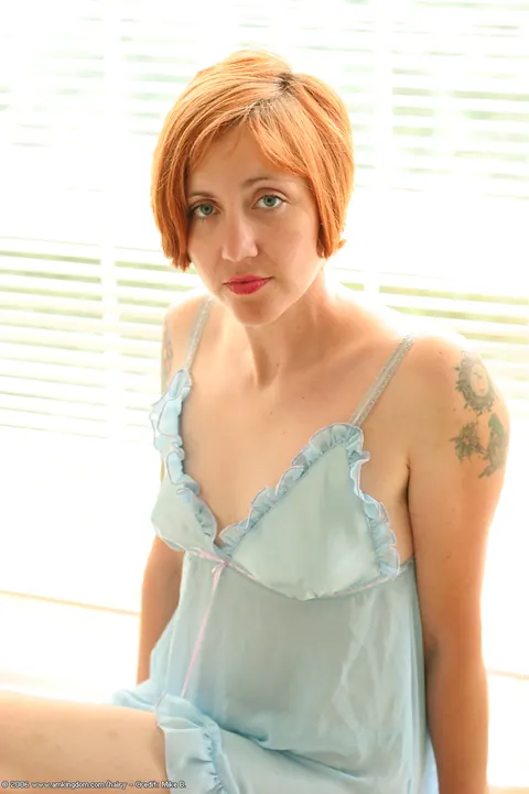 Hairy Woman Stands Nude and Turns to Show Her Bush – photo 2 of 21