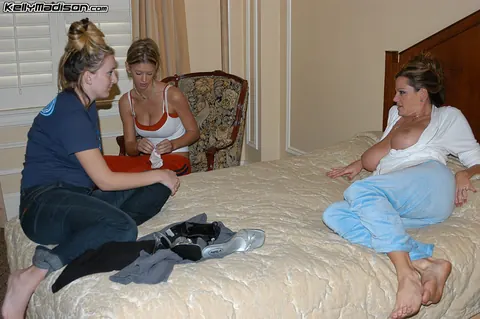 Brooke Banner: Tall Blonde MILF in Jeans Strips with a Slim Woman in a Hotel – photo 7 of 16
