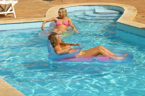 Abigail Toyne: Blonde British MILF in a Bikini and Stockings Spreads by the Pool – photo 7 of 21
