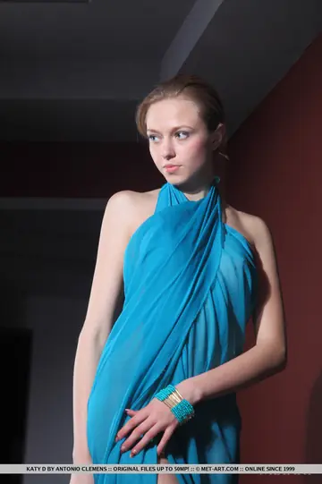 Tall Slim Blonde Strips Out of Her Skirt and Shows Her Shaved Pussy