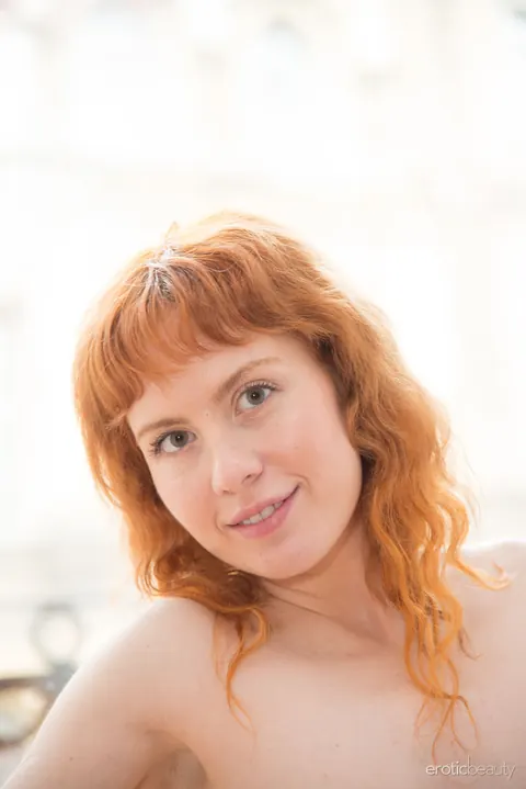 Redhead Strips Nude to Show Her Shaved Pussy – photo 12 of 16