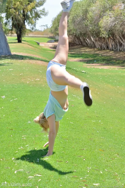 Velvet Rain: Thick Blonde Plays with a Dildo Outdoors in Shorts and Socks – photo 12 of 15