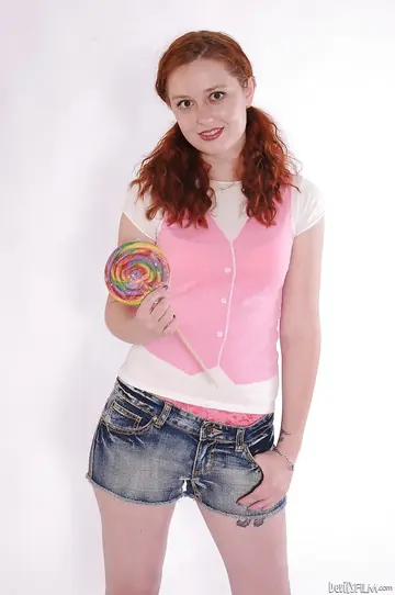 Meloney Danells – Tattooed Redhead PAWG in Heels and Shorts Fingers Her Pussy