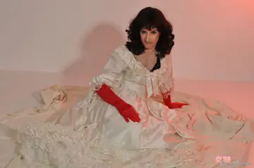 Trans Woman Undresses and Poses Nude Displaying Her Cock and Body