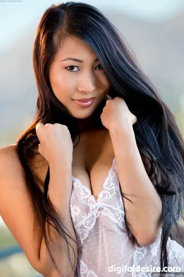 Busty Asian Babe Undresses and Shows Off Her Body