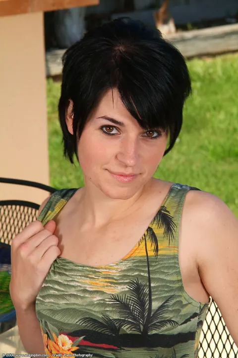 Brunette with Short Hair Spreads Her Pussy Outdoors – photo 2 of 21