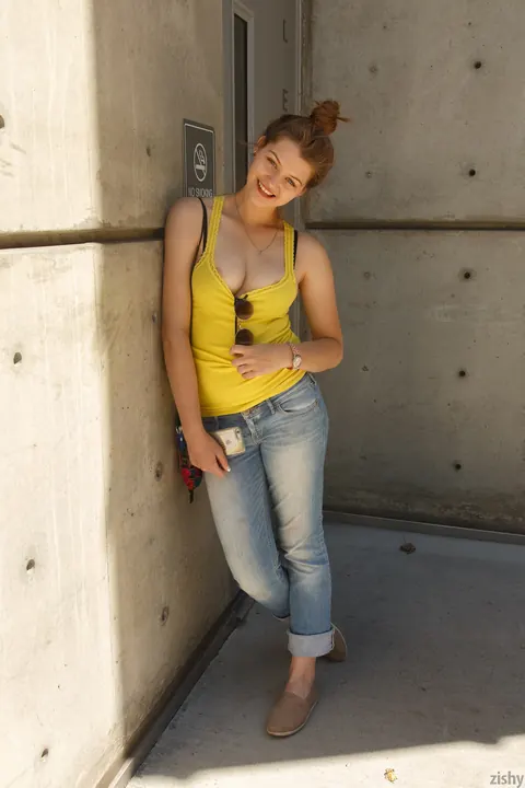 Mia Valentine: British Blonde in Glasses Flashes Her Big Tits Outdoors in Jeans and Boots – photo 3 of 12
