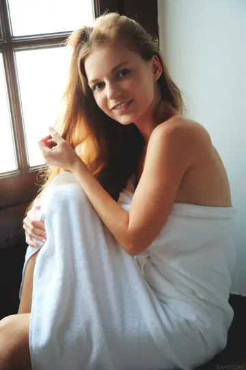Petite Ukrainian Brunette Undresses and Spreads Her Hairy Pussy