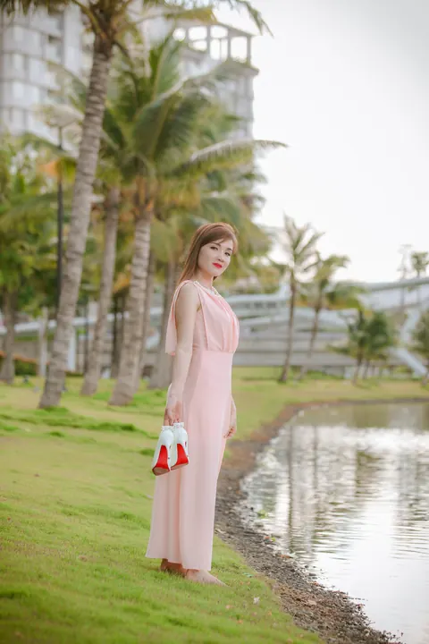 Asian Woman Poses in a Dress Outdoors – photo 1 of 21