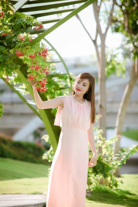 Asian Woman Poses in a Dress Outdoors – photo 13 of 21
