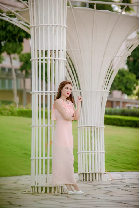 Asian Woman Poses in a Dress Outdoors – photo 8 of 21