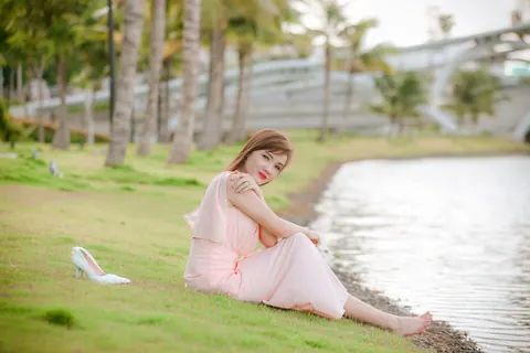 Asian Woman Poses in a Dress Outdoors – photo 6 of 21