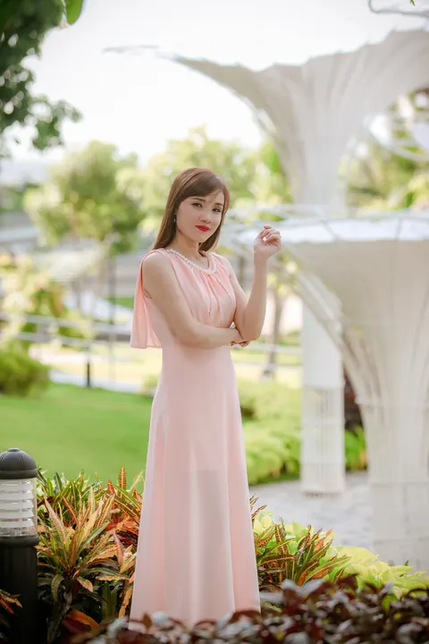 Asian Woman Poses in a Dress Outdoors – photo 11 of 21