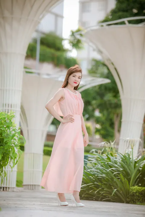 Asian Woman Poses in a Dress Outdoors – photo 7 of 21