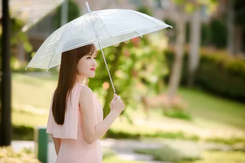 Asian Woman Poses in a Dress Outdoors – photo 19 of 21