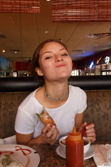Penelope Jones – Petite Brunette Rolls Up Her Shorts to Show Her Ass in Public
