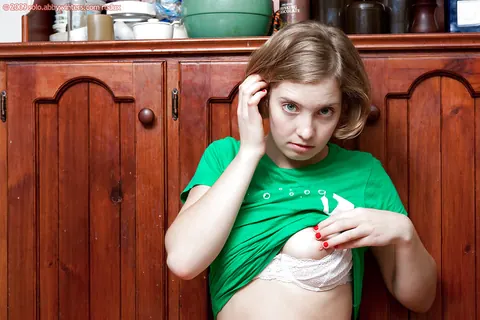 Kara Dashka: Busty Blonde Fingers Her Hairy Pussy in the Kitchen – photo 8 of 16