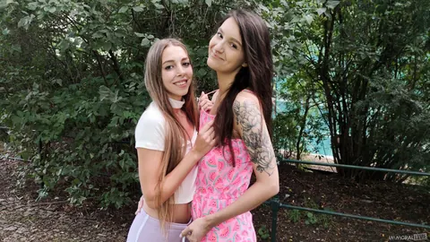 Mary Popiense: Two Brunettes in Shorts Ride Cock and Use a Dildo Outdoors in a Threesome – photo 1 of 15