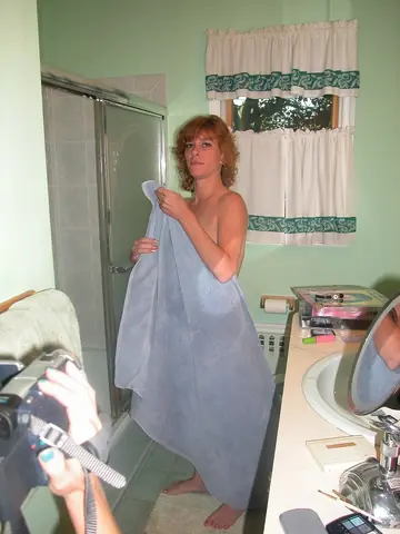 Redhead MILF Shows Her Big Natural Tits and Tattoo