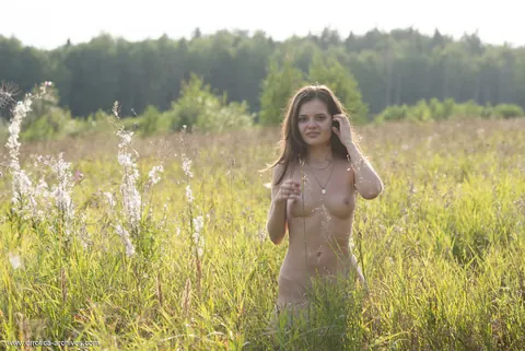 Brunette Strips Out of Her Shorts on a Country Lane – photo 2 of 16