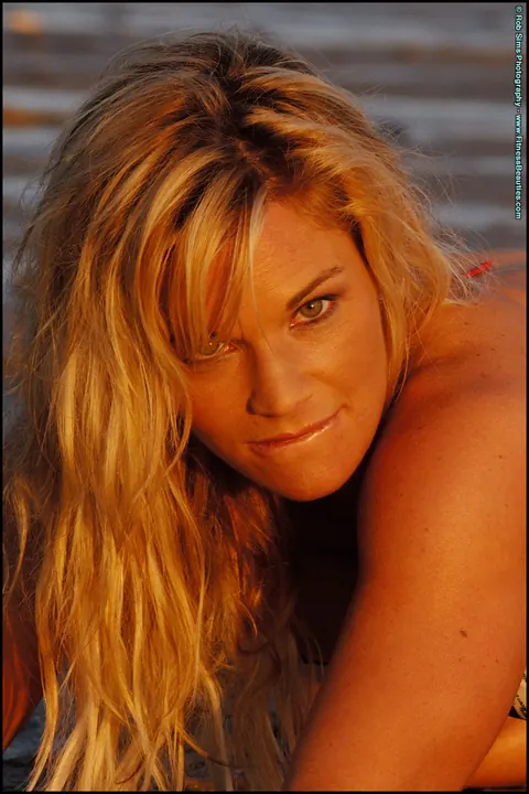 Michele Levesque: Busty Blonde MILF Models Bikini and Spreads on the Beach – photo 12 of 15