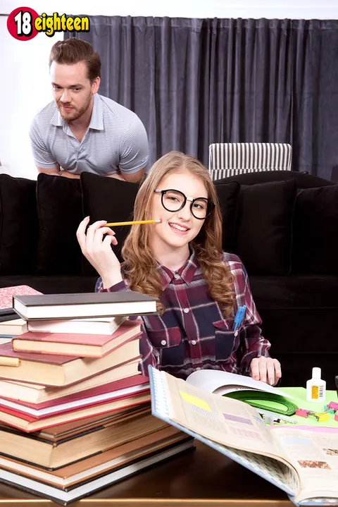 Melody Marks: Busty Redhead Poses in Jeans and Glasses at the Office – photo 8 of 16