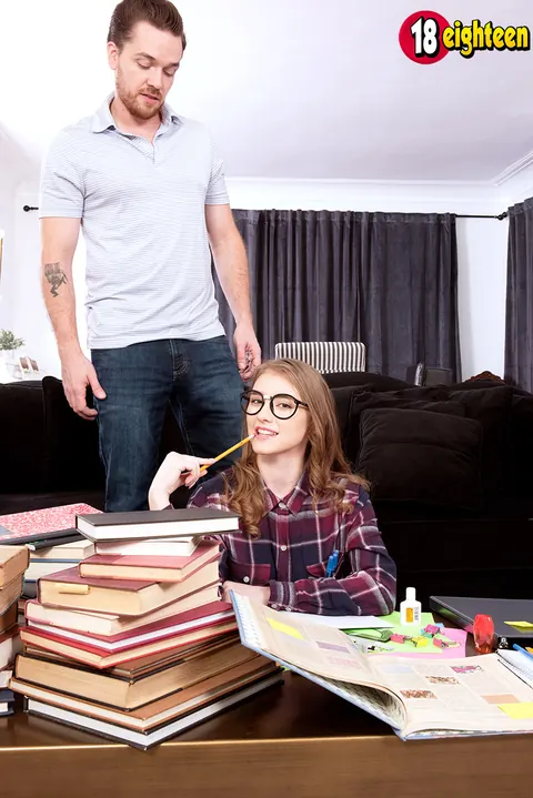 Melody Marks: Busty Redhead Poses in Jeans and Glasses at the Office – photo 9 of 16