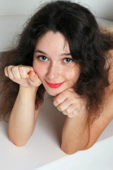 Yennefer: Thick Curly Brunette in a Dress Shows Her Pussy – photo 20 of 20