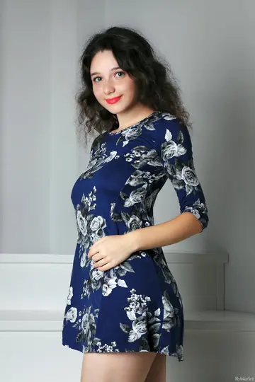 Thick Curly Brunette in a Dress Shows Her Pussy
