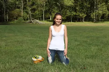 Petite Brunette with Natural Tits Fingers Her Shaved Pussy Outdoors