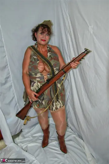 Busty Brunette MILF Flashes Lingerie and Stockings Under Military Skirt