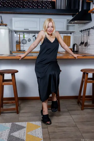 Busty Ukrainian Blonde Strips Out of Her Skirt in the Kitchen