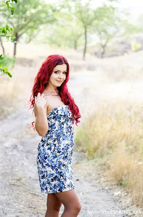 Redhead Poses in a Summer Dress and Heels Outdoors – photo 10 of 15