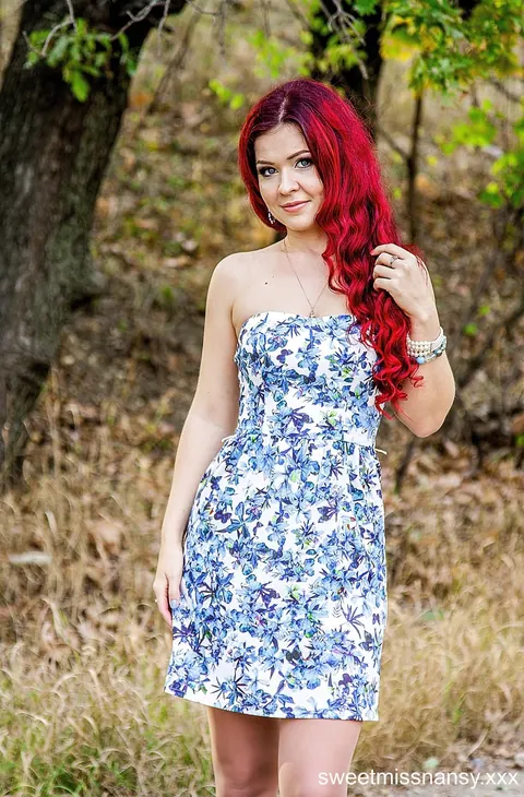 Redhead Poses in a Summer Dress and Heels Outdoors – photo 14 of 15