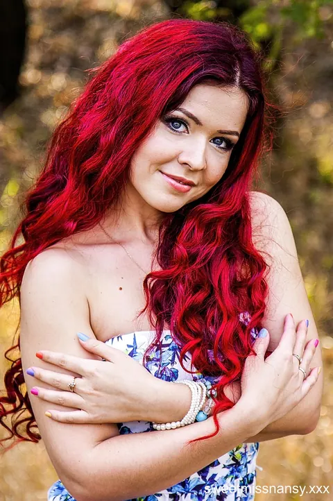 Redhead Poses in a Summer Dress and Heels Outdoors – photo 2 of 15