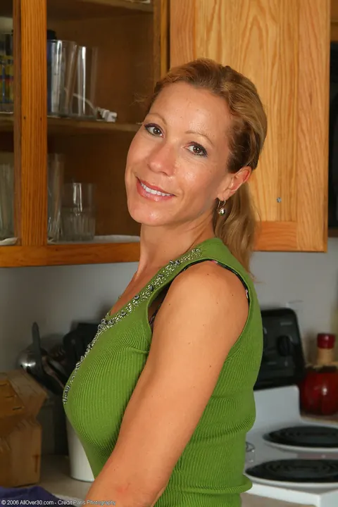Kimmie Morr: Mature Blonde in Lingerie Strips and Spreads in the Kitchen – photo 4 of 20