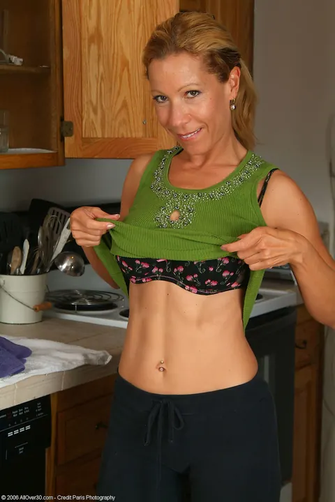 Kimmie Morr: Mature Blonde in Lingerie Strips and Spreads in the Kitchen – photo 5 of 20