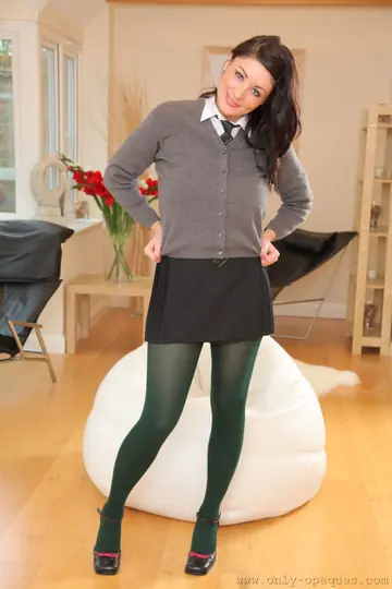 British MILF in a Skirt and Pantyhose Spreads and Reveals Her Big Tits