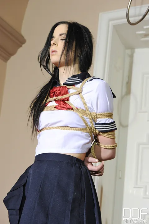 Amber Nevada: Spanish Brunette in a Skirt Bound and Sucking Cock – photo 13 of 21
