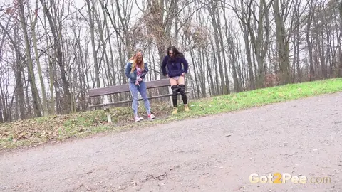 Chrissy Fox: Brunette and Redhead Squat to Pee in Jeans Near Park Bench – photo 13 of 15