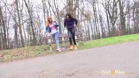 Chrissy Fox: Brunette and Redhead Squat to Pee in Jeans Near Park Bench – photo 14 of 15